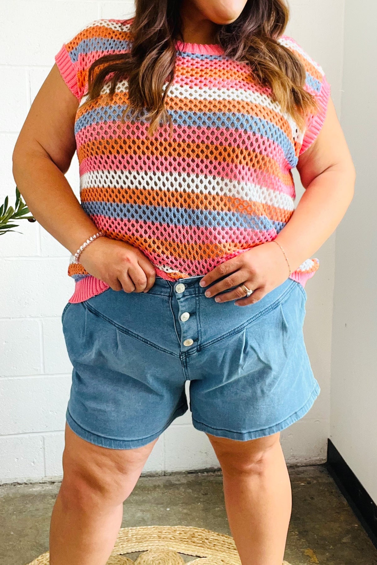 Faded Blue High Rise Pleated Button Down Denim Shorts: front